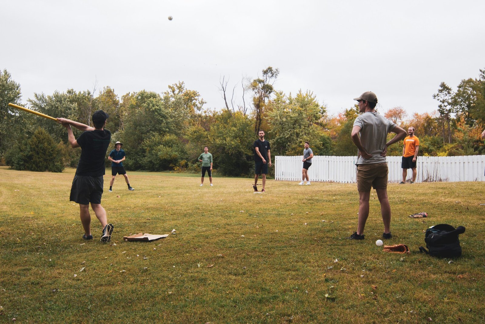 people playing golf during daytime